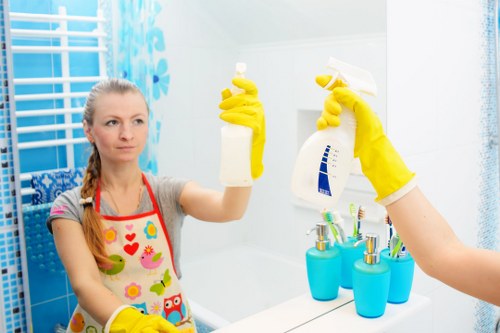 Professional carpet cleaner at work in a London home