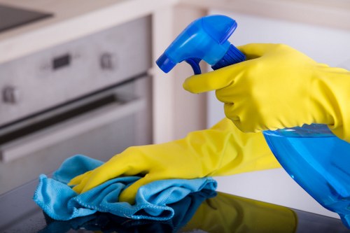 Experienced carpet cleaner treating a stubborn stain